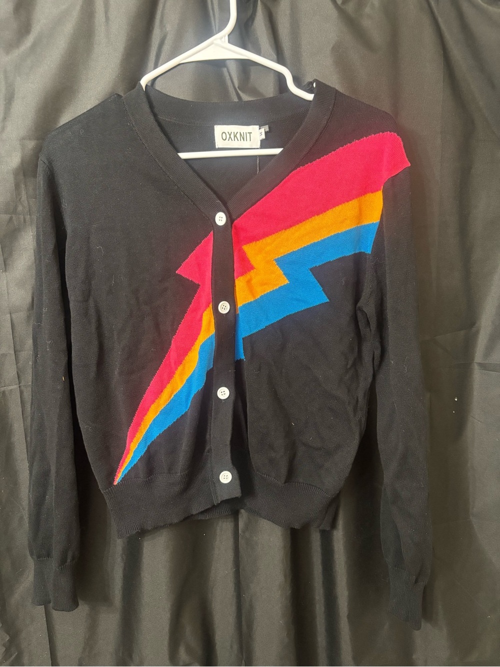OXKNIT Black Cardigan with Pink, Orange & Blue Lightning Stripe